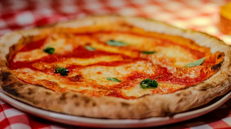 Gourmet truffle mushroom pizza with fresh herbs